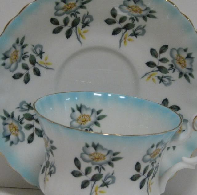   Saucer Set with White Buttercups & Trimmed in Gold; made in England