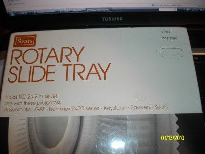 VINTAGE  ROTARY SLIDE TRAY HOLDS 100 2 X 2  